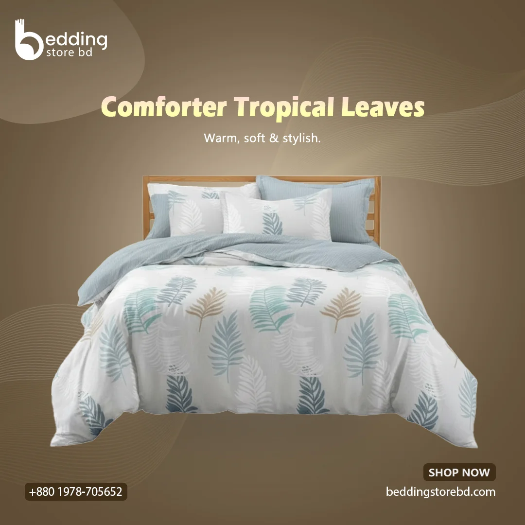 Comforter Tropical leaves print with stylish quilting patterns spread on bed