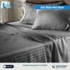 Wrinkle-resistant Ash Stripe Bed Sheet neatly tucked on a mattress, highlighting its clean and crisp aesthetic.